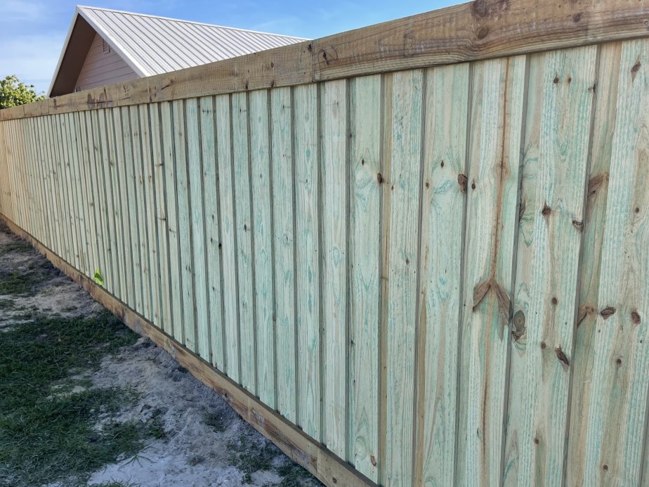 Gulf Breeze FL cap and trim style wood fence