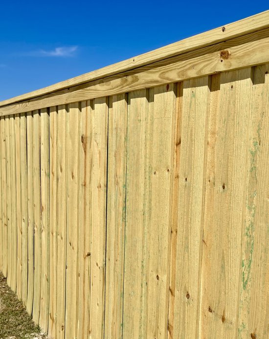 Beautiful example of a Board on Board style wood fence installed in Panama City, Florida