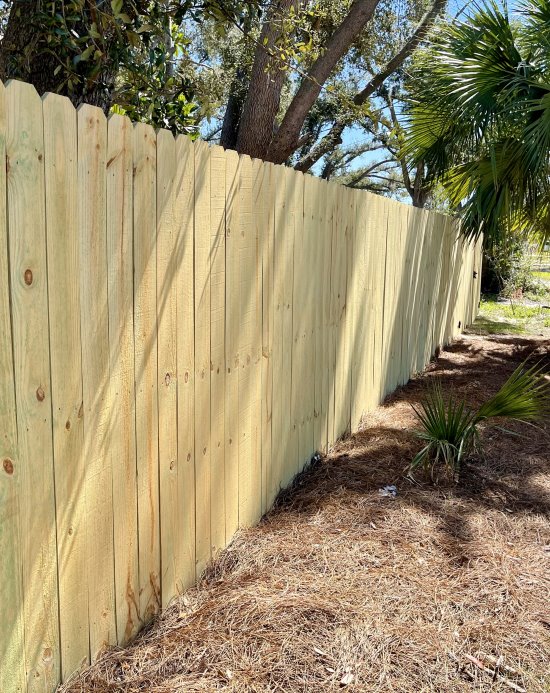 Beautiful example of a Stockade Style Wood Privacy fence installed in Panama City, Florida